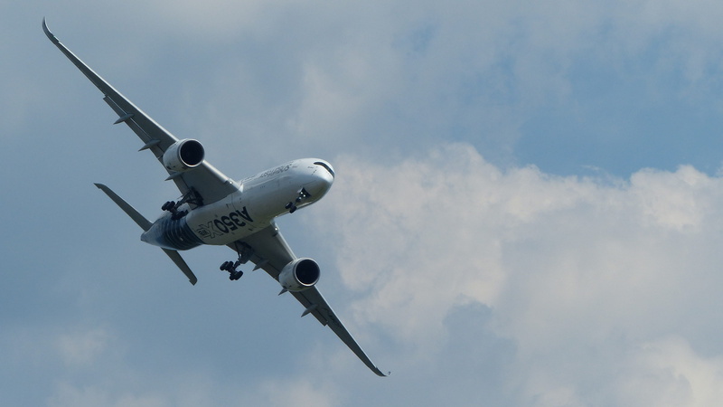 no people, low angle view, a350, travel, cloud - sky, air vehicle, above, blue, motion, airplane, government, mode of transportation, commercial airplane