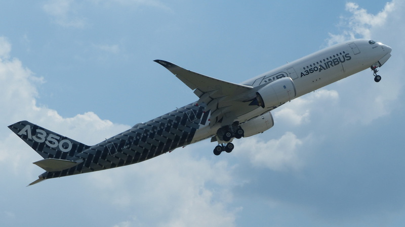 cloud - sky, berlin, military, mode of transportation, low angle view, above, flying, plane, on the move, airplane, motion, nature, a350, aerospace industry