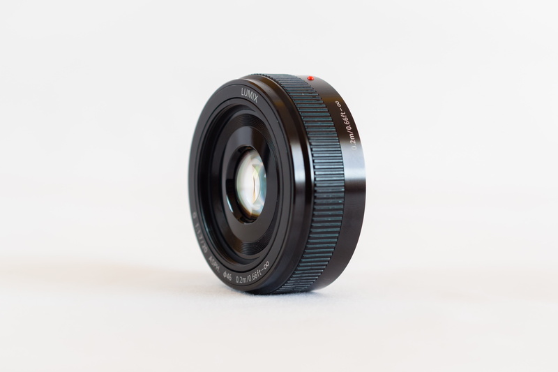 close-up, white background, lens, photography, no people, digital camera, geometric shape, lens - optical instrument, black color, photographic equipment