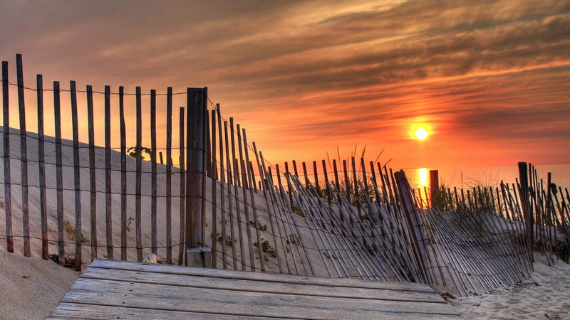 architecture, sun, beauty in nature, sky, no people, environment, landscape, city, beach, sunset, security, nature, built structure, skyscape, outdoors