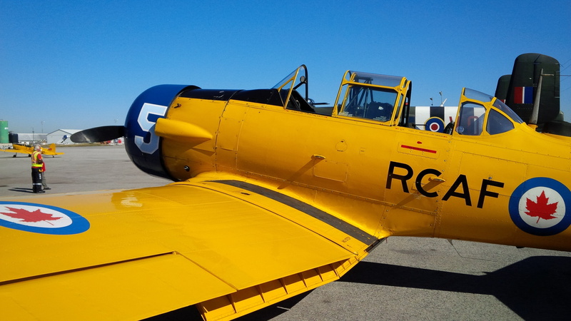 harvard, transportation, road, nature, communication, construction industry, airplane, blue, yellow, clear sky, sky, military, day, aircraft, propeller