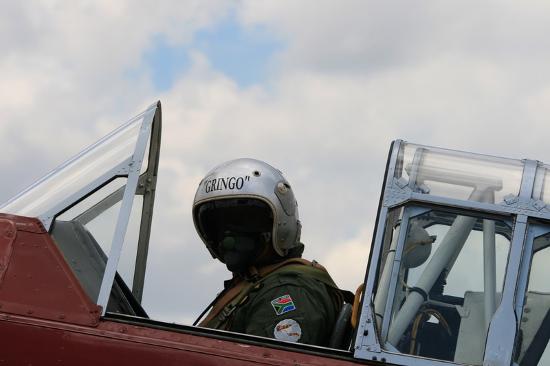 harvard, 1080P, security, aircraft, airplane, headshot, pilot, cockpit, one person, low angle view, uniform, cloud - sky, outdoors, army, aerospace industry