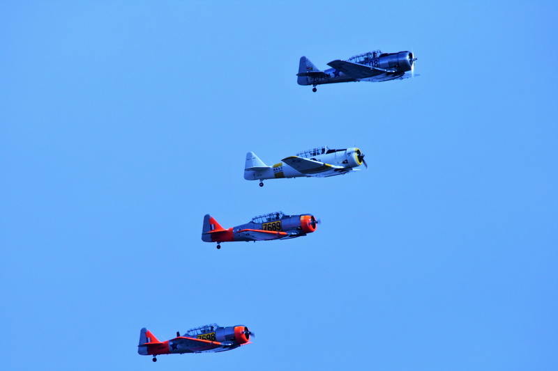 people, mode of transportation, air show, stacked, men, 4K, motion, outdoors, flying, mid-air, blue, sky, american t-6, copy space, aerobatics, nature