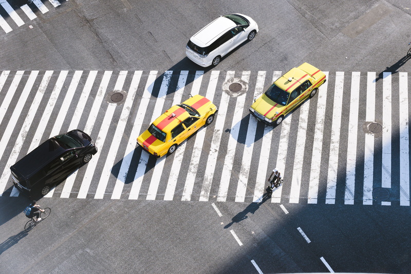 person, urban Scene, transport, mode of Transport, yellow Taxi, architecture, modern, simple, photo, cyclist, outdoors, speed, pedestrian crossing, high Angle View