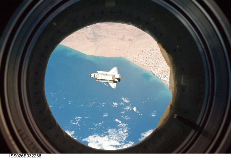 indoors, space, ship, aerial, spaceship, water, photography, directly below, flying, Space Shuttle, white, geometric shape, Clouds, architecture, window