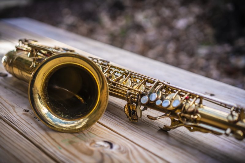 paper, musician, brass instrument, gold, classical style, music, wind instrument, saxophonist, arts culture and entertainment, golden, jazz, metal, trumpet