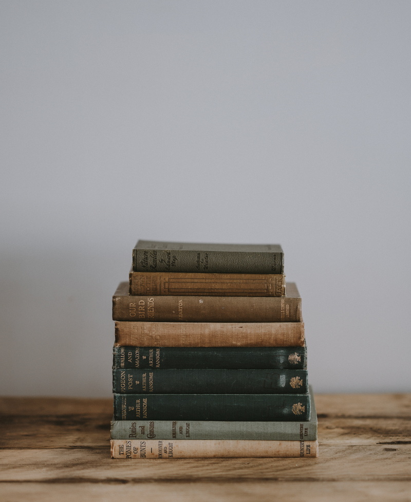 single object, old, indoors, wood, copy space, pile, luxury, abundance, title, finance, book, publication, books, reading, still life, close-up, piled
