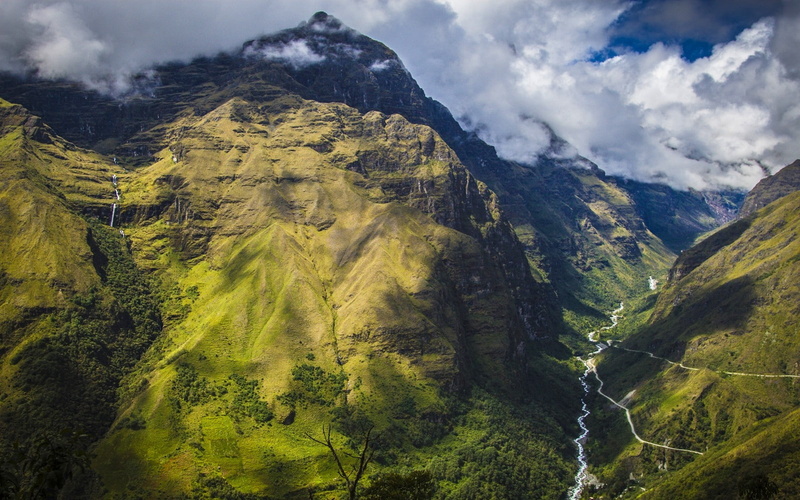 tree, environment, no people, mountain peak, Bolivia, plant, pine tree, mountain range, non-urban scene, green color, tranquility, waterfall, grass, cloud - sky