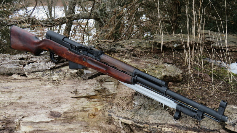 bare tree, wood - material, tree trunk, tranquility, beauty in nature, plant, forest, gun, land, SKS, metal, sunlight, outdoors, rifle, nature, field, tree