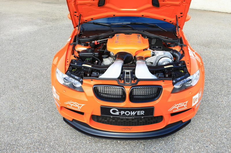 motor vehicle, power, gts, orange color, 1080P, man made object, outdoors, day, road, ii, industry, sk, close-up, land vehicle, city, transportation, no people