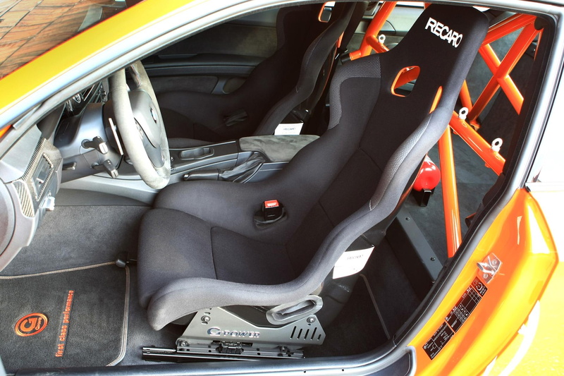 control, no people, outdoors, gts, land vehicle, mode of transportation, side view, day, steering wheel, m, ii, motor vehicle, travel, g, orange color