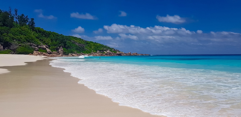 travel destinations, the tropics, tranquility, ocean, paradise, sky, vacations, tranquil scene, seychelles, travel, cloud - sky, land, lagoon, petit anse