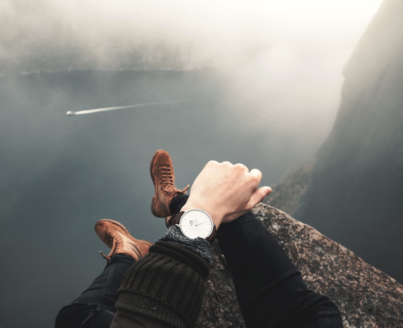 coast, outdoors, body part, nature, explore, sitting, boot, edge, fashion, style, human body part, one person, mountain, low section, wanderlust, boat