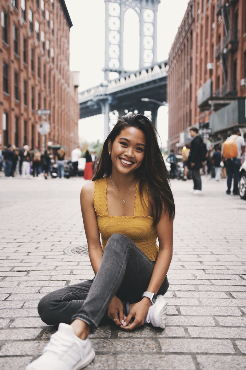 city Life, real People, joy, togetherness, sitting, leisure Activity, cheerful, pathway, happiness, pose, two People, youth Culture, bridge, sunlight, caucasian Ethnicity