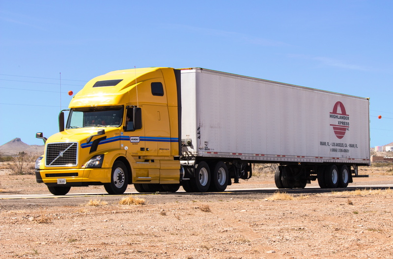 business, rig, semi truck, freight, blue, mode of transportation, trucking, road, sky, big, load, truck, semi-Truck, driving, heavy, motor vehicle, delivering