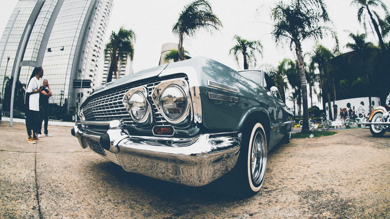 chrome, adult, transportation system, shiny, day, parked, vintage car, low rider, automobile, street, men, vintage, vehicle, lowrider, automotive, hood