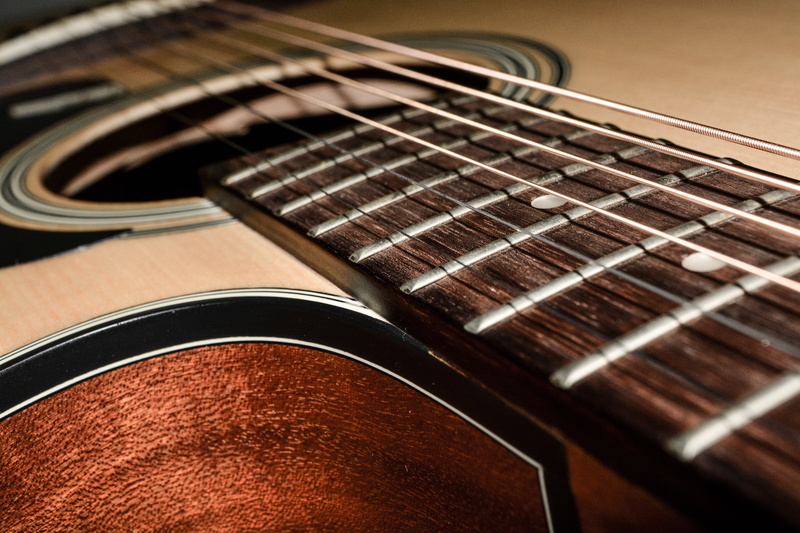 black, still life, selective focus, leather, acoustic, vast, studio shot, in a row, close-up, strings, wood - material, music, musical equipment, takamine