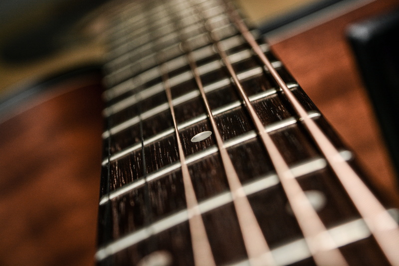 strings, d series, electric guitar, no people, musical equipment, musical instrument string, woodwind instrument, instrument, fretboard, brown, arts culture and entertainment