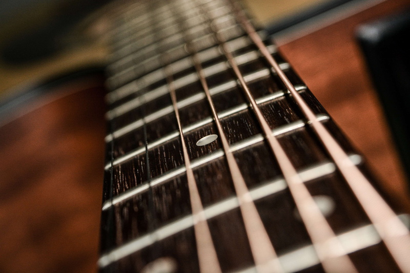 wood - material, takamine, indoors, fretboard, no people, music, acoustic guitar, wind instrument, vast, electric guitar, brown, strings, arts culture and entertainment