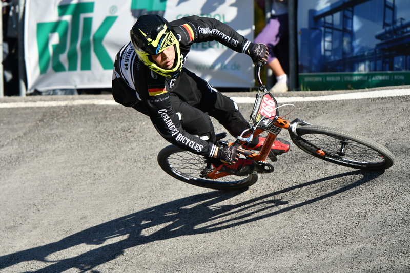 men, mode of transportation, skill, headwear, rad-bundesliga, action, spectacular, germany, lifestyles, sport, outdoors, cyclists, sunlight, ride, shadow