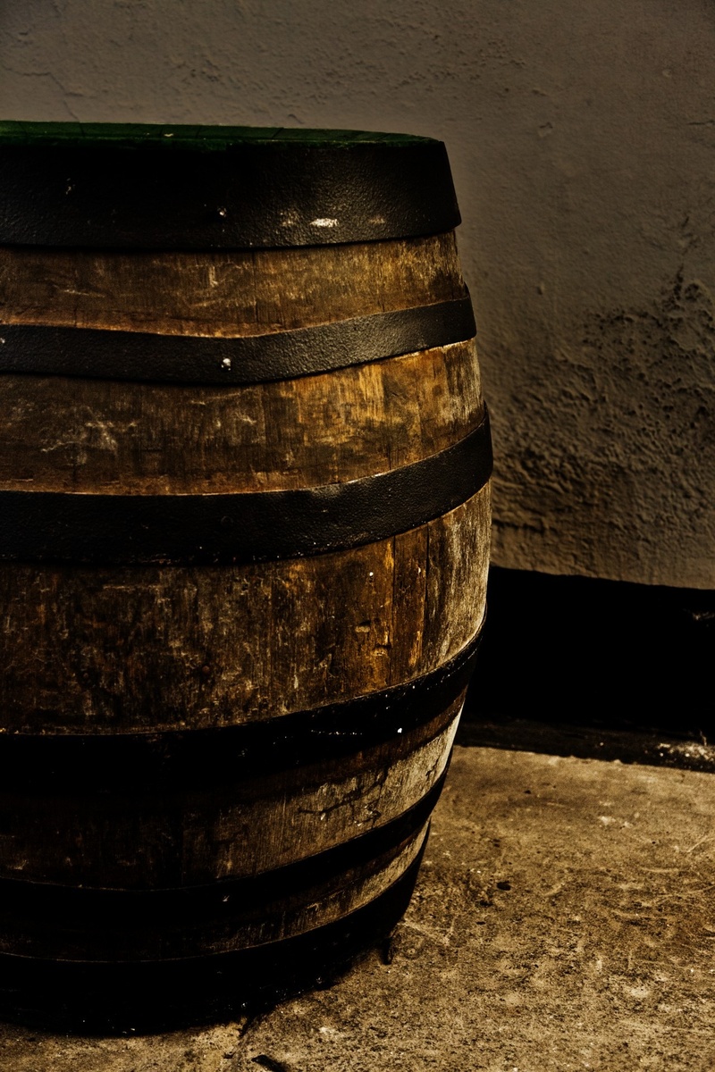concrete, storage, wine cask, brewery, wooden, tire, black, beer, food and drink, wine, close-up, barrel, still life, table, alcohol, surface, lager, container