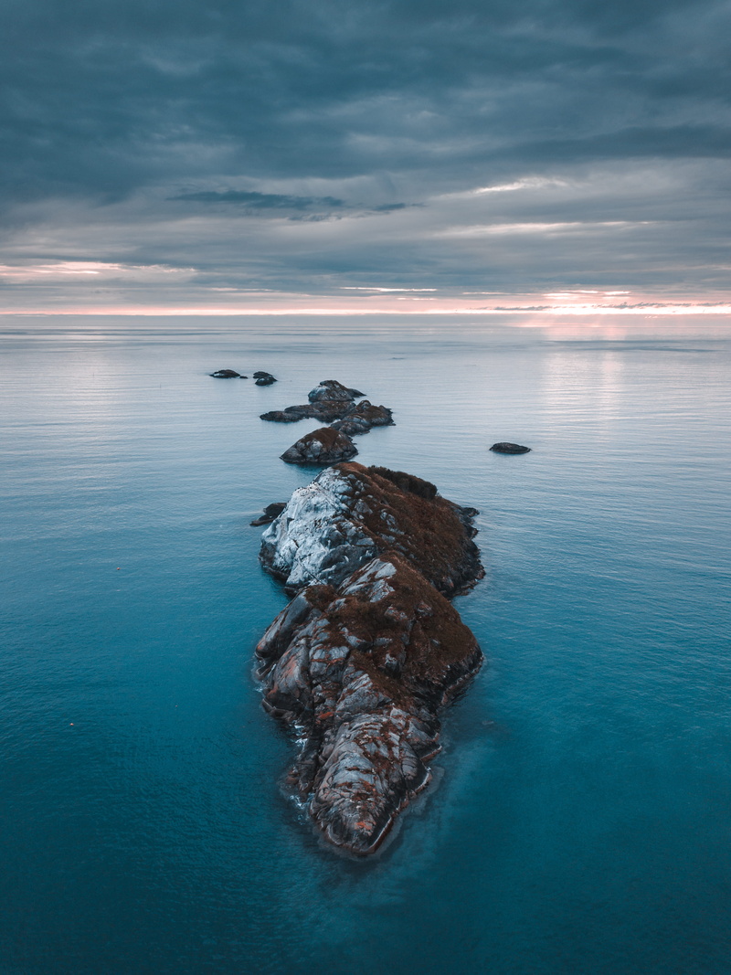 nature, rock, sea, scenic, beauty in nature, norway, evening, horizon over water, clouds, seascape, horizon, outdoors, brown, island, cloud - sky, drone photography