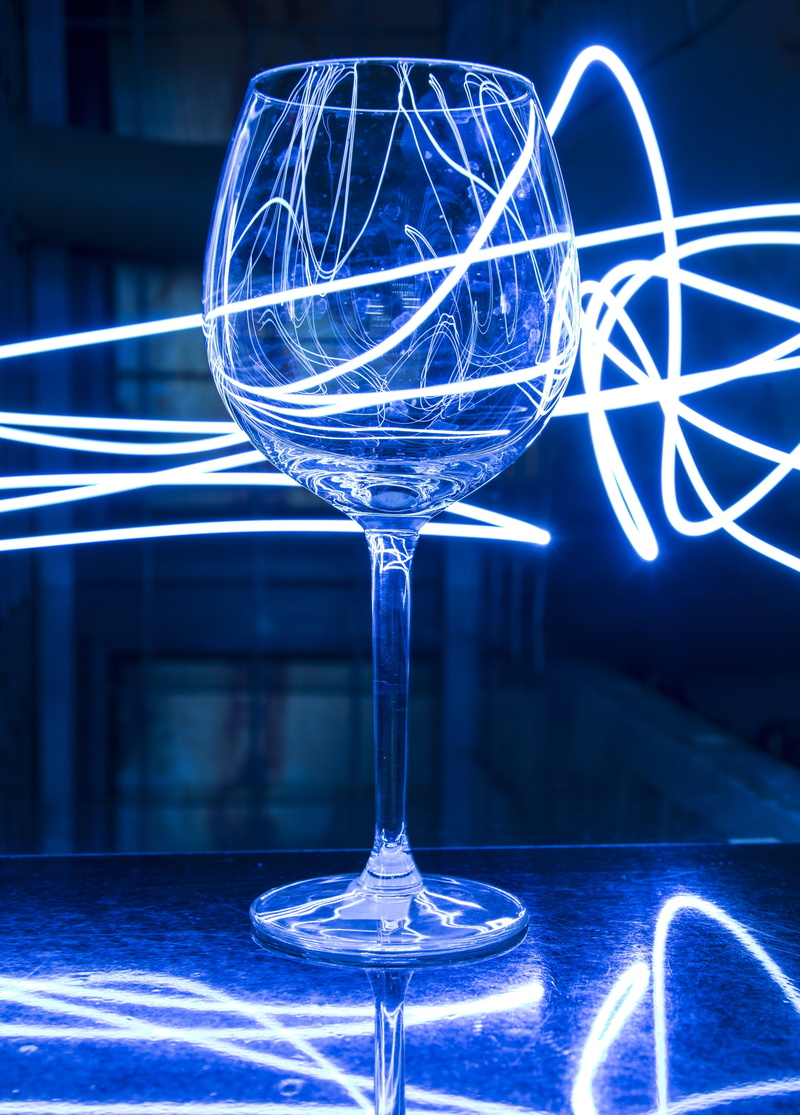 neon, wine, blue, table, alcohol, glass, connection, household equipment, no people, space, science, light, wineglass, crystal, sphere, backgrounds, motion