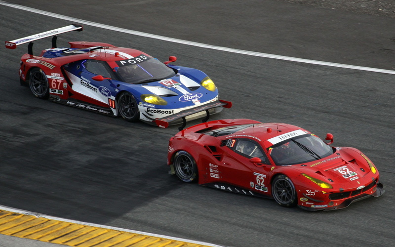 high angle view, motor racing track, competitive sport, professional sport, motor vehicle, land vehicle, mode of transportation, motion, racecar, race cars ferrari ford gt ferrari 488 gtb