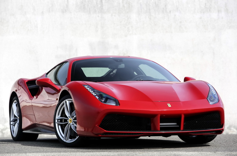 car, motor vehicle, white color, mode of transportation, racecar, copy space, city, red, luxury, no people, modern, day, wheel, wealth, sports car, stationary