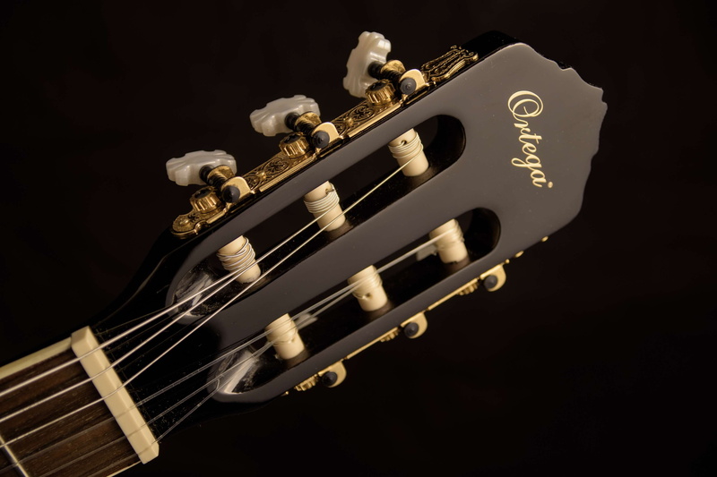 classical guitar, human body part, studio shot, vintage, nylon strings, rock music, electric guitar, arts culture and entertainment, indoors, string instrument