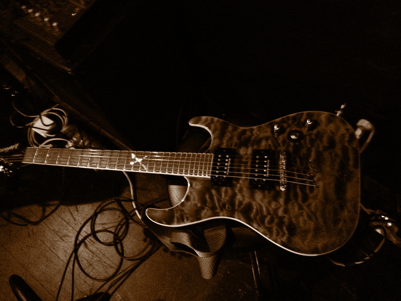 brown, axe, sound, black background, electric, electric Guitar, black, single object, no people, rock Music, equipment, string, metal, indoors, musical Instrument