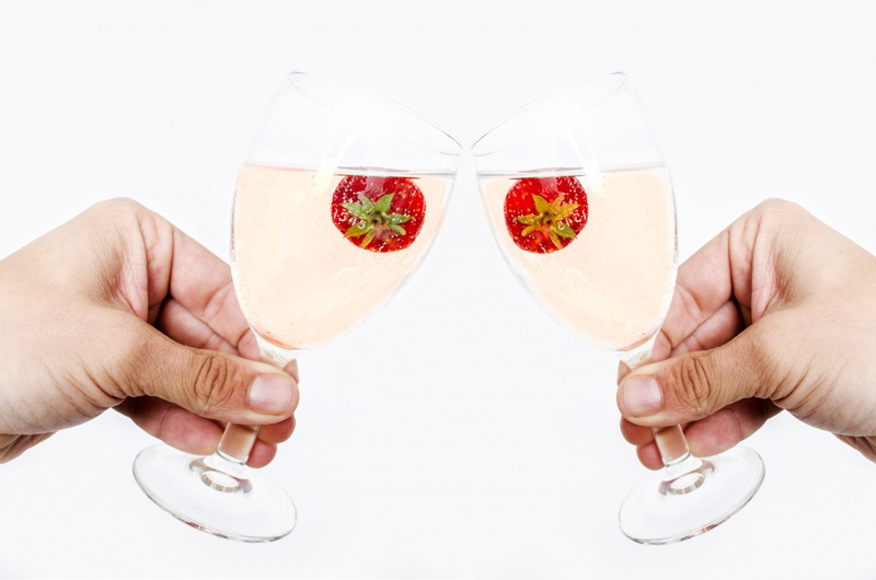 studio shot, glass, human body part, couple - relationship, toast, emotion, cut out, people, human hand, clock, bottle, holding, men, white background