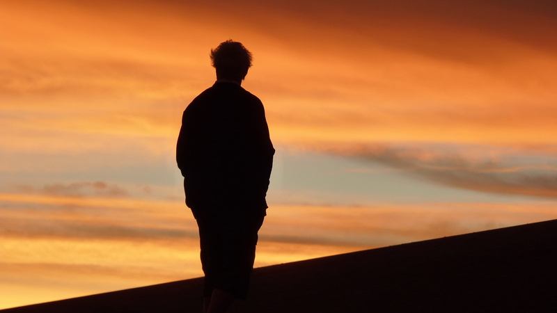 silhouette, tranquil scene, sky, person, tranquility, one person, men, man, leisure activity, desert, sunset, adult, cloud - sky, beauty in nature, one man only