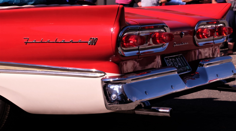 headlight, automobile, transportation, motor vehicle, lighting, human, light, speed, alloy wheel, convertible, tail light, indoors, retro styled, mode of transportation