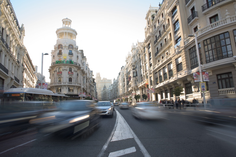 architecture, on the move, building exterior, spain, sky, buildings, urban, transportation, blurred motion, time, speed, outdoors, capital, gran vía, travel destinations