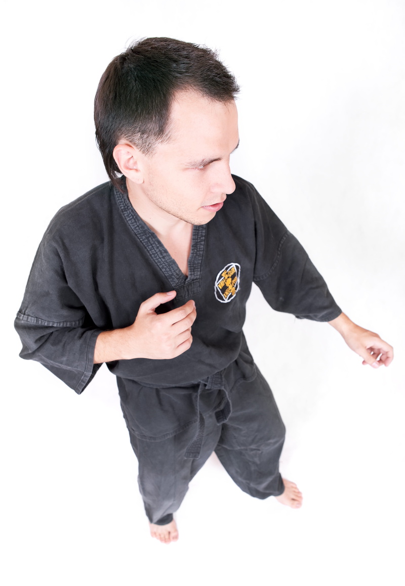 cut out, indoors, hobby, men, one person, gi, chuan, lifestyles, fight, full length, people, high angle view, male, combat, black color, foot, outline
