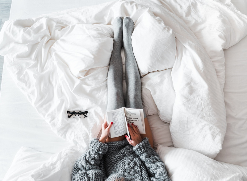 duvet, necktie, winter, book, obscured face, newspaper, books, linen, top, high angle view, white color, alone, unrecognizable person, one person, relaxation