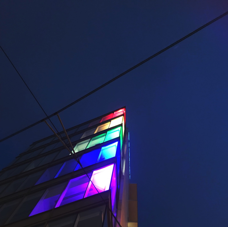 copy space, multi colored, dark, city, architecture, lights, light, clear sky, citylife, illuminated, window, electricity, wires, manchester, night, red