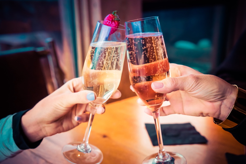 beverage, celebratory toast, human body part, refreshment, household equipment, congratulations, human hand, focus on foreground, bubbles, drinking, event
