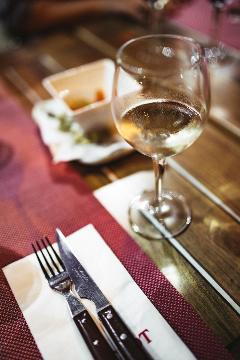 kitchen utensil, refreshment, restaurant, table knife, tablecloth, dinner, women, no People, drinking Glass, eating utensil, dining, fork, wineglass, glass