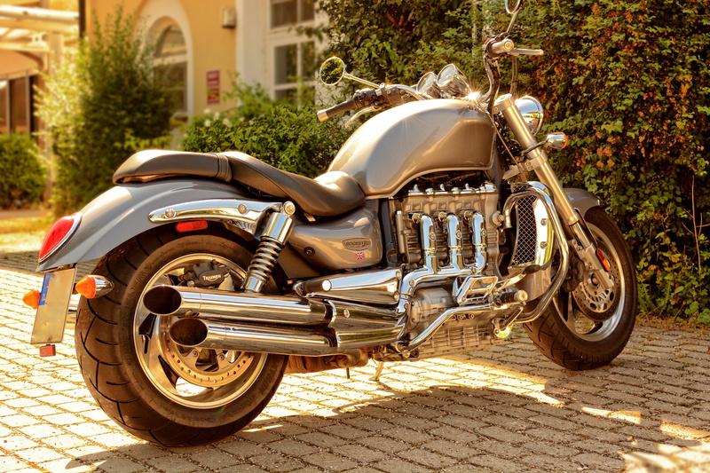 force, car, dynamics, architecture, power, chrome, motor vehicle, cruiser, city, motor, built structure, technology, sunlight, triumph rocket, shiny, triumph