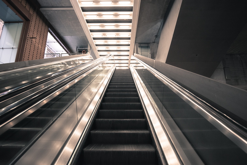 architecture, futuristic, staircase, entrance, speed, blurred Motion, train station, steps, indoors, no people, stairway, business, city, moving up, convenience