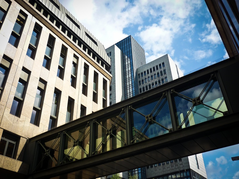 building, office building, bluish, city, glass, outdoors, travel destinations, sky, office building exterior, modern, day, built structure, low angle shot