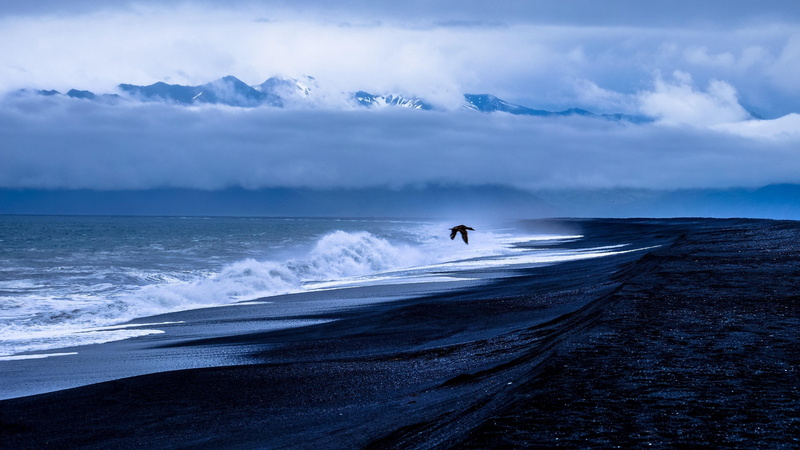 cloud, motion, bluish, beauty in nature, seascape, shore, adventure, atmosphere, water, waterscape, one person, horizon, land, cloudy, headland, cloud - sky
