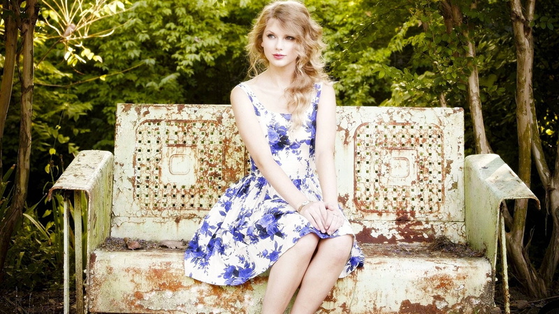 Taylor Swift, sitting, lifestyles, fashion, hair, front view, portrait, beauty, real people, plant, looking at camera, 2K, dress, leisure activity, contemplation