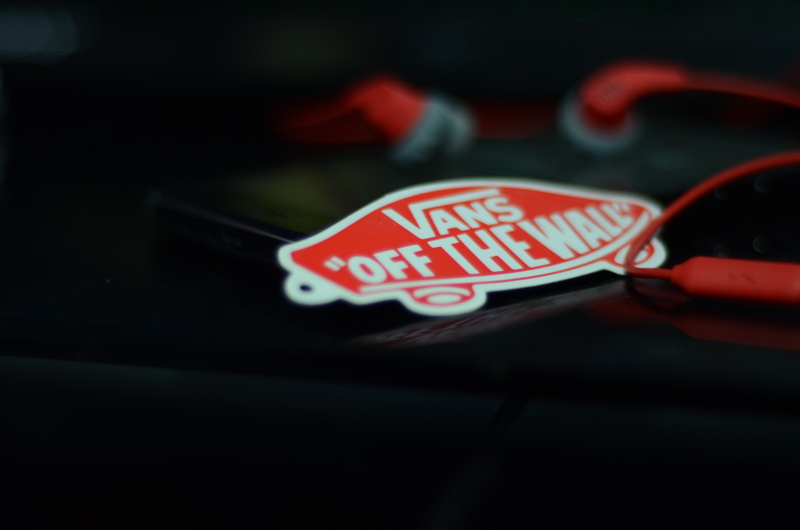 capital letter, transportation, close-up, security, city, communication, earphones, selective focus, text, mode of transportation, western script, night