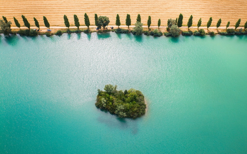 green color, water, outdoors, architecture, day, no people, building exterior, island, blue, turquoise colored, nature, built structure, sea, swimming pool