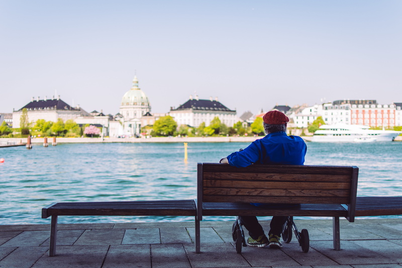 only women, outdoors, dress shirt, body, europe, blue, looking at view, building exterior, 5K, daytime, brown, cityscape, bench, near, rear view, travel Destinations