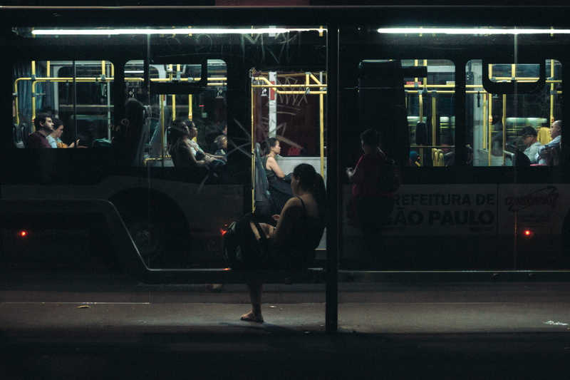 sitting, large group of people, transportation system, subway train, evening, commuter, woman, travel, train, mode of transportation, dark, bench, women
