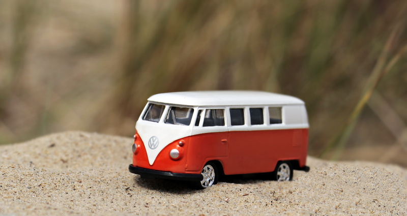 orange-and-white, transport, past, toy, focus on foreground, small, travel, toy car, hippie, nostalgia, bulli, camping, classic, model car, land vehicle